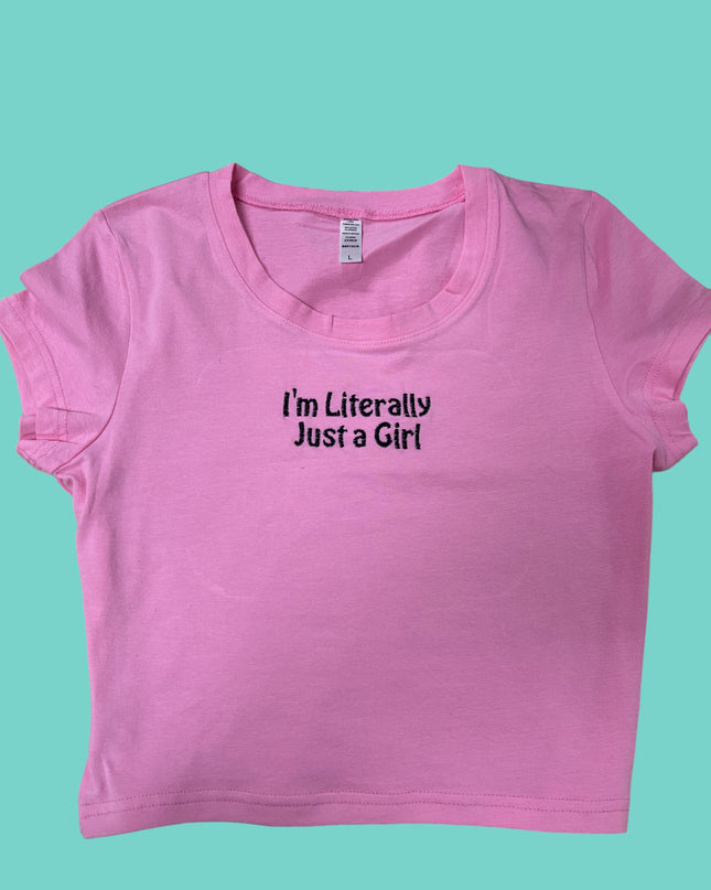 a pink shirt that says i'm literally just a girl
