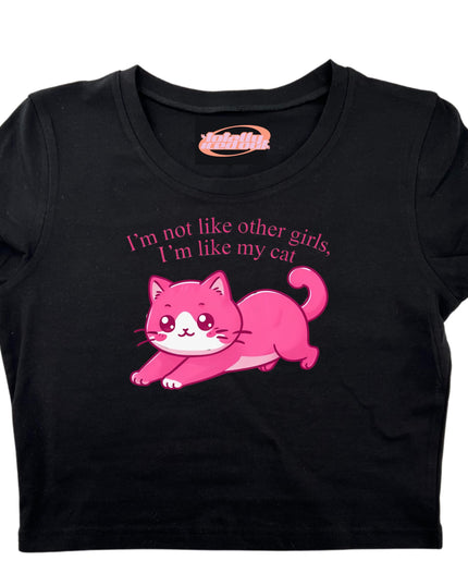 a black shirt with a pink cat on it