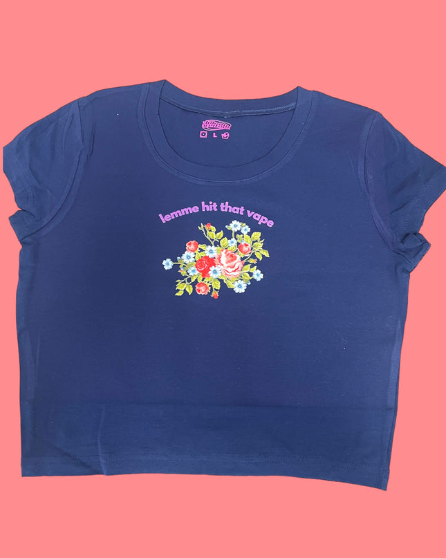 A navy blue t-shirt with a floral design and the text "lemme hit that vapor" printed on it.