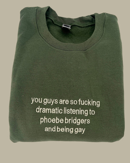 a green t - shirt with a poem written on it
