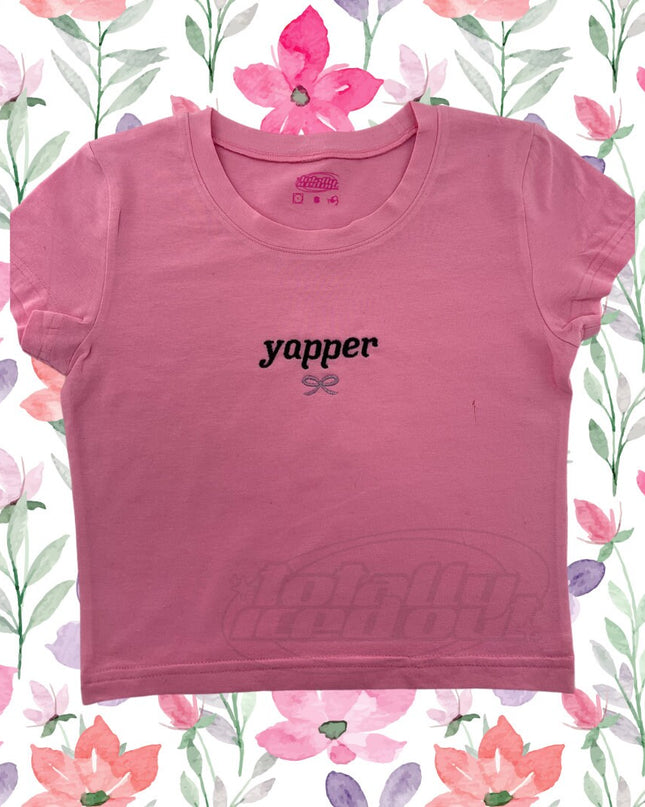a pink t - shirt with the word yoper printed on it