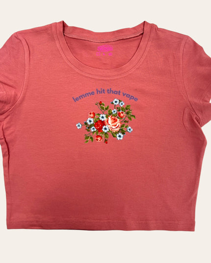 a t - shirt with flowers on the chest