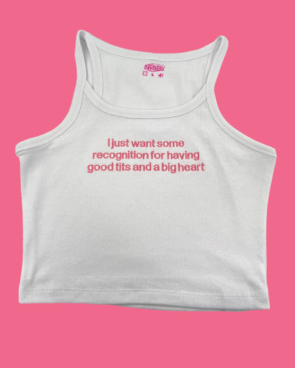 a white tank top with a pink background