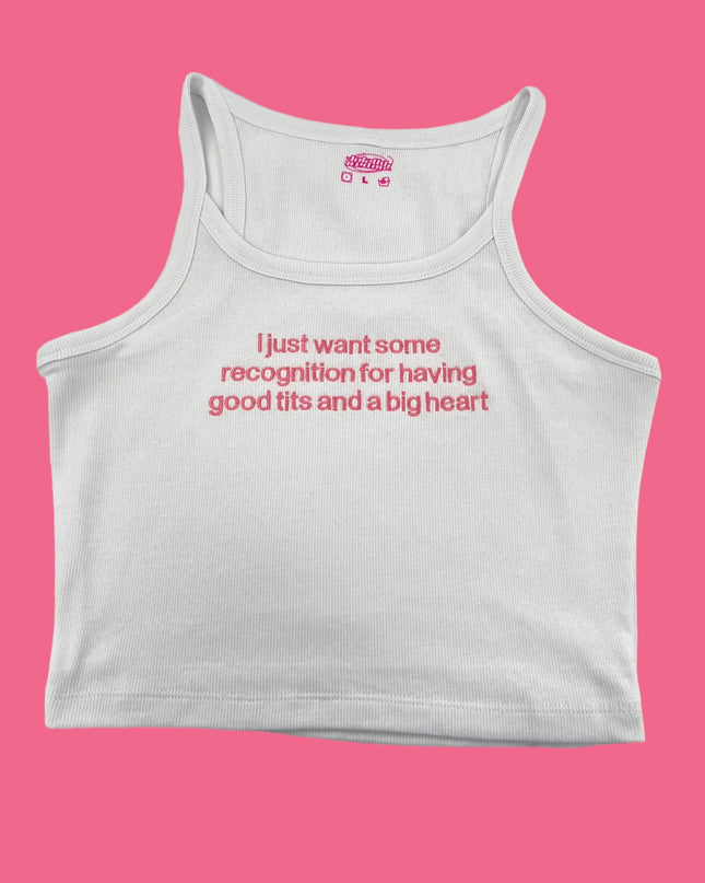 a white tank top with a pink background