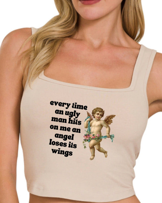 a woman wearing a tank top with a cupid on it