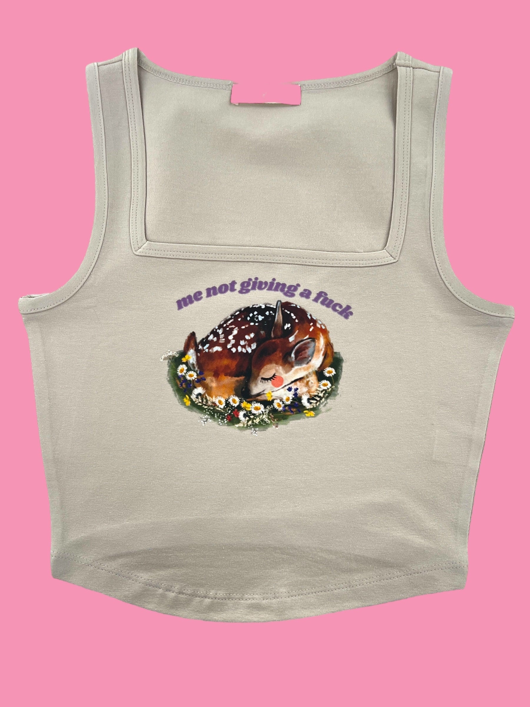 a tank top with a picture of a deer on it