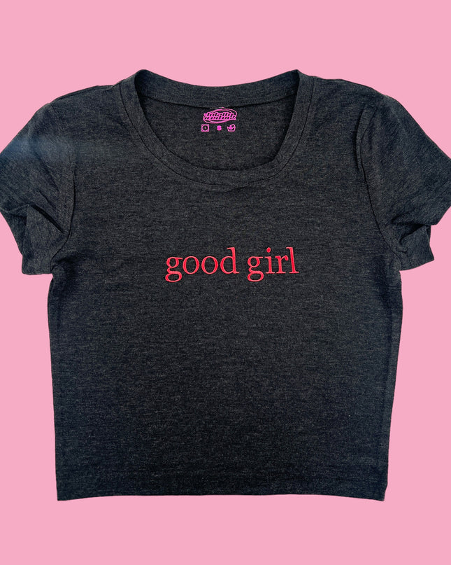 a t - shirt that says good girl on it