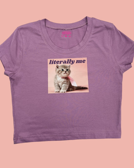 a women&#39;s purple t - shirt with a picture of a cat on it