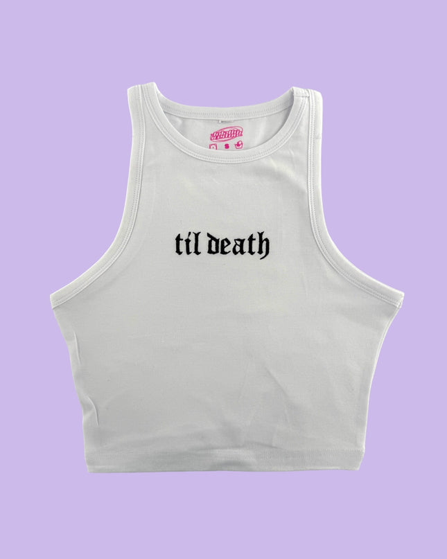 a white crop top with the word til death printed on it