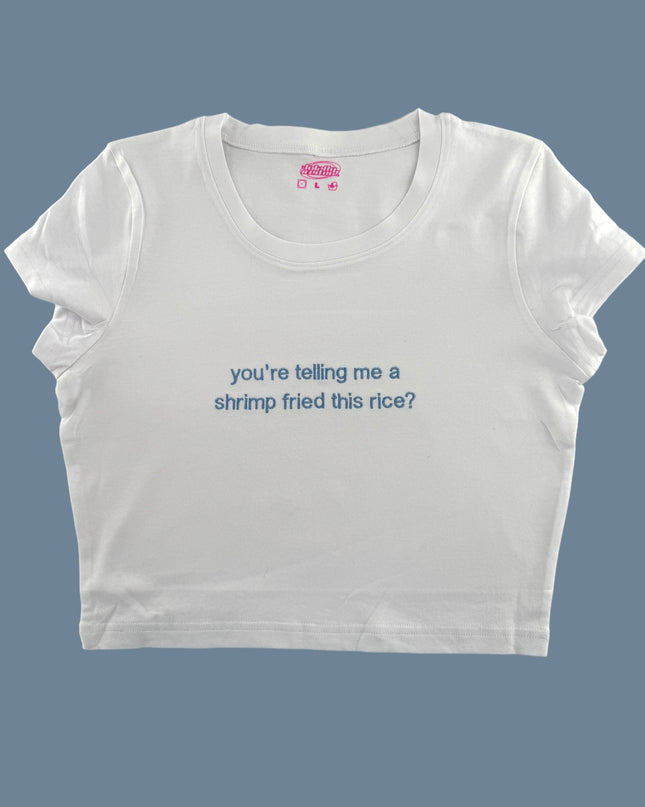 a white t - shirt with blue writing that says you&#39;re telling me a