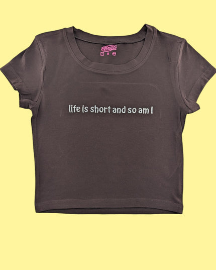 a t - shirt that says life is short and so am