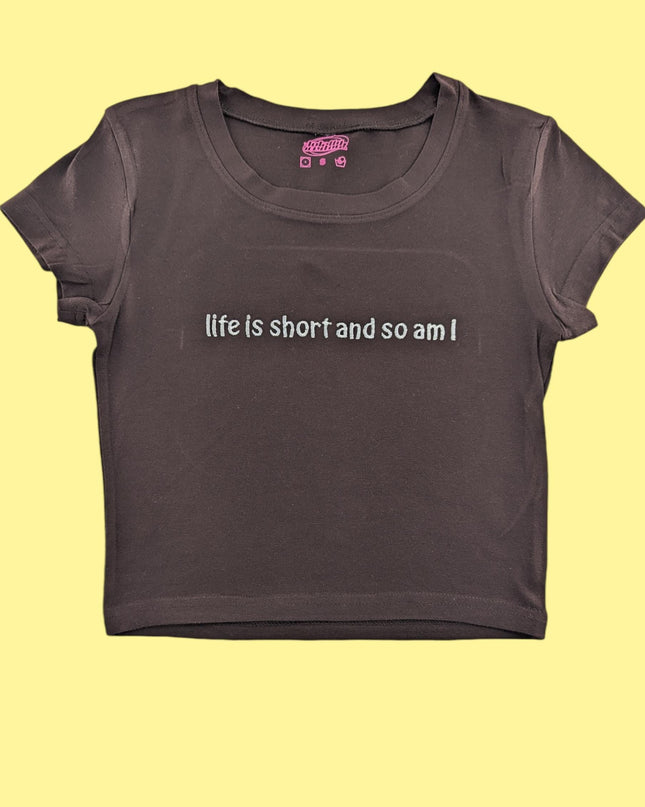 a t - shirt that says life is short and so am
