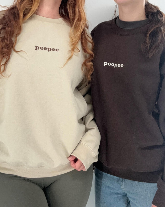 a couple of women standing next to each other