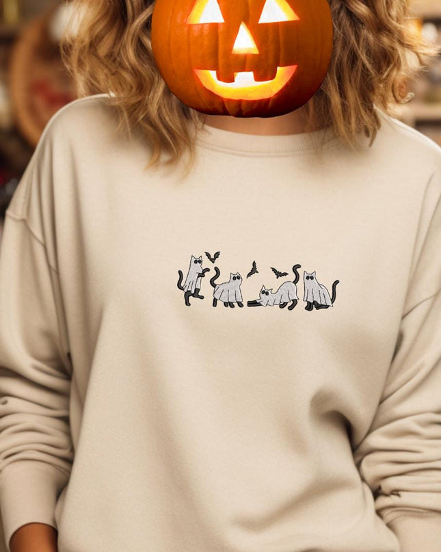 a woman with a pumpkin on her head