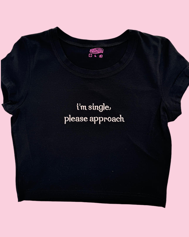 a black t - shirt that says i&#39;m single please approach