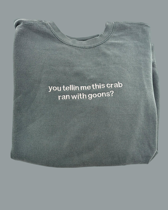 a gray t - shirt with white writing that says, you tell me this crab