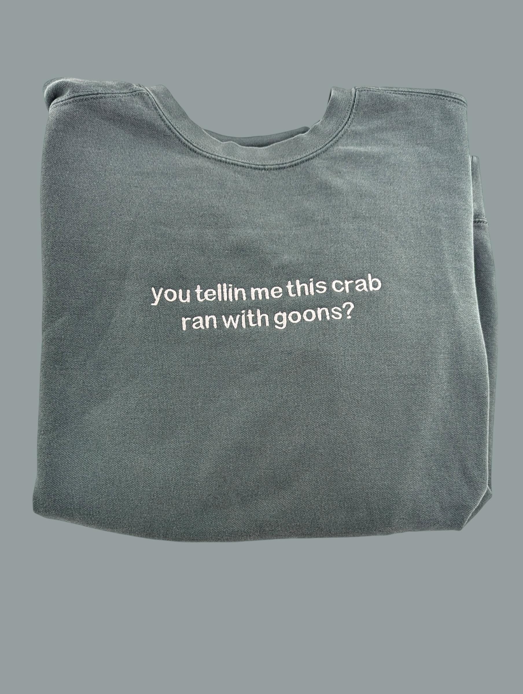 a gray t - shirt with white writing that says, you tell me this crab