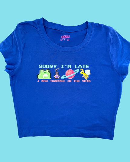 a blue t - shirt that says sorry i&#39;m late and trapped in the