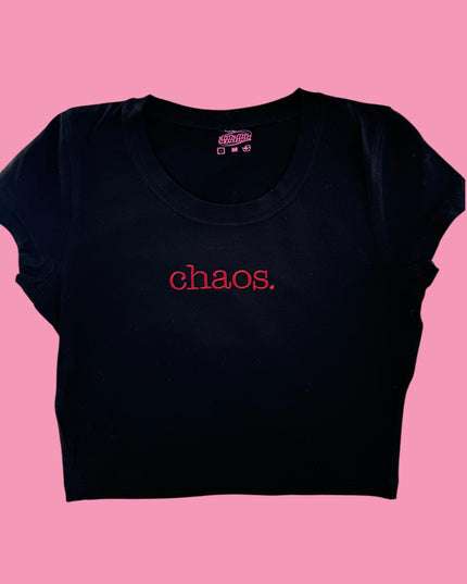 a black crop top with the word chaos printed on it