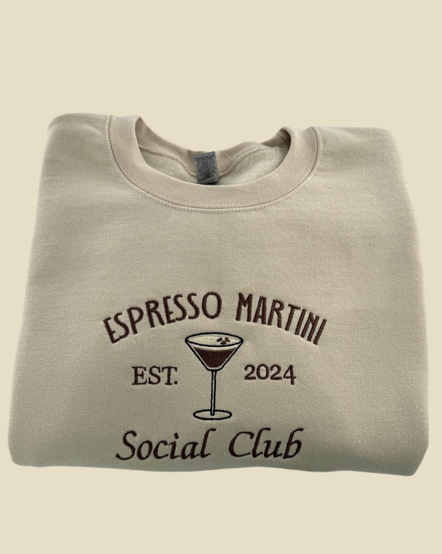 a white shirt with a martini glass on it