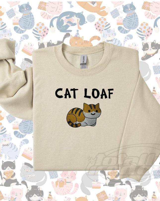 a cat sweatshirt with the words cat loaf on it
