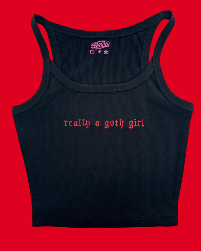a black crop top that says, really a goth girl
