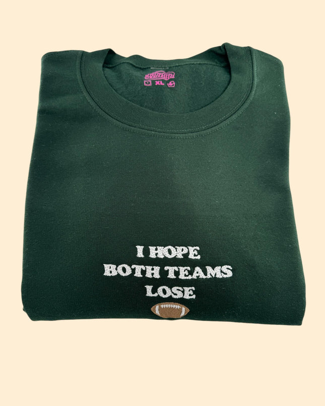 a green t - shirt that says i hope both teams lose