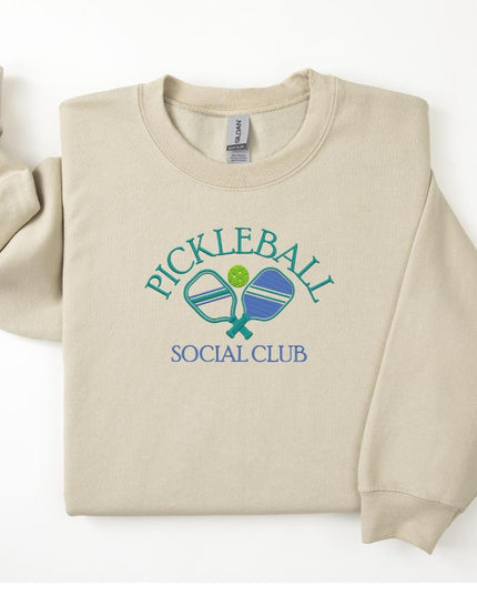 a white sweatshirt with a blue and green logo
