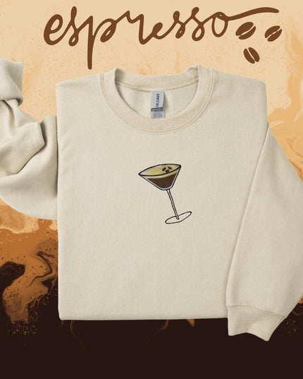 a sweater with a picture of a wine glass on it