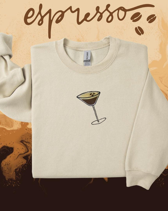 a sweater with a picture of a wine glass on it