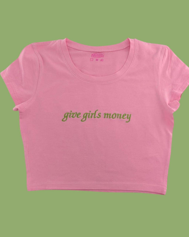 a pink crop top that says,'give girls money '