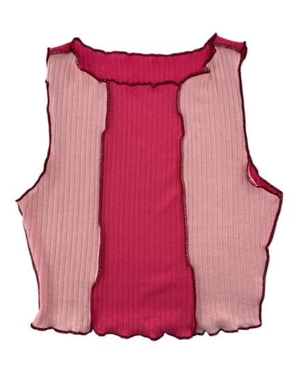 a pink and pink top with pleated sides