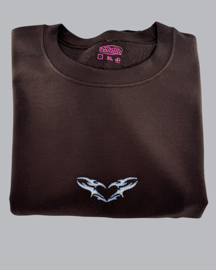 a t - shirt with a picture of a bird on it