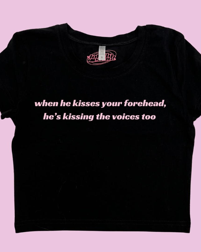 a t - shirt that says when he kisses your forehead, he's kissing