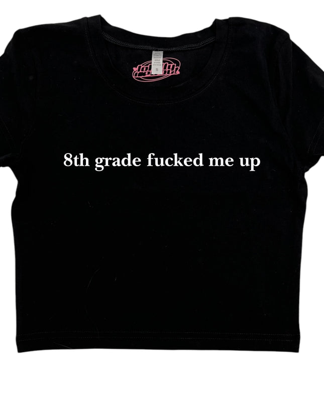 a black shirt that says 8th grade fucked me up