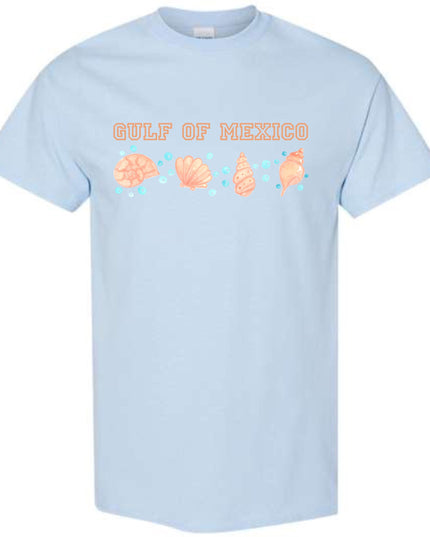 a light blue shirt that says out of mexico
