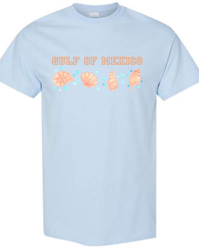 a light blue shirt that says out of mexico