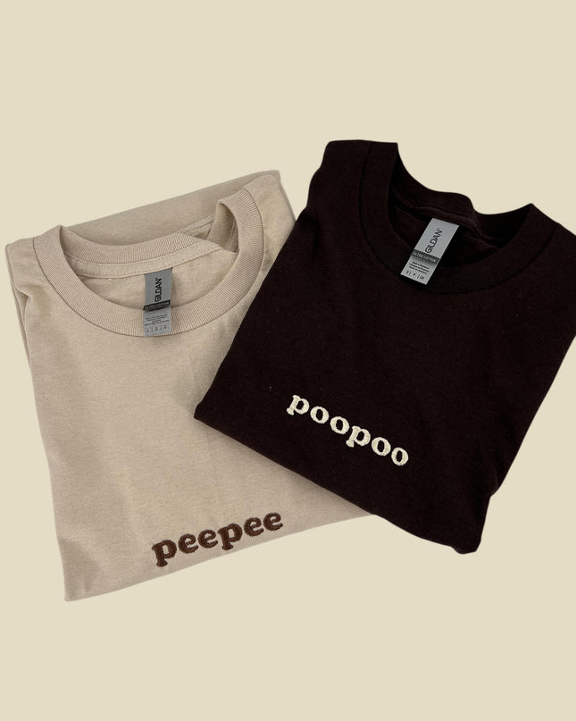 a couple of shirts that are sitting on a table