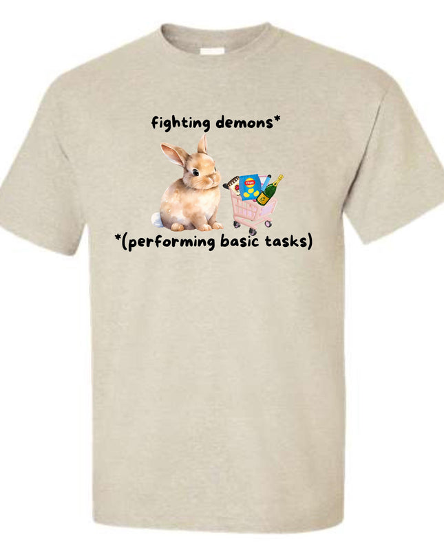 a white t shirt with a picture of a dog and a pig