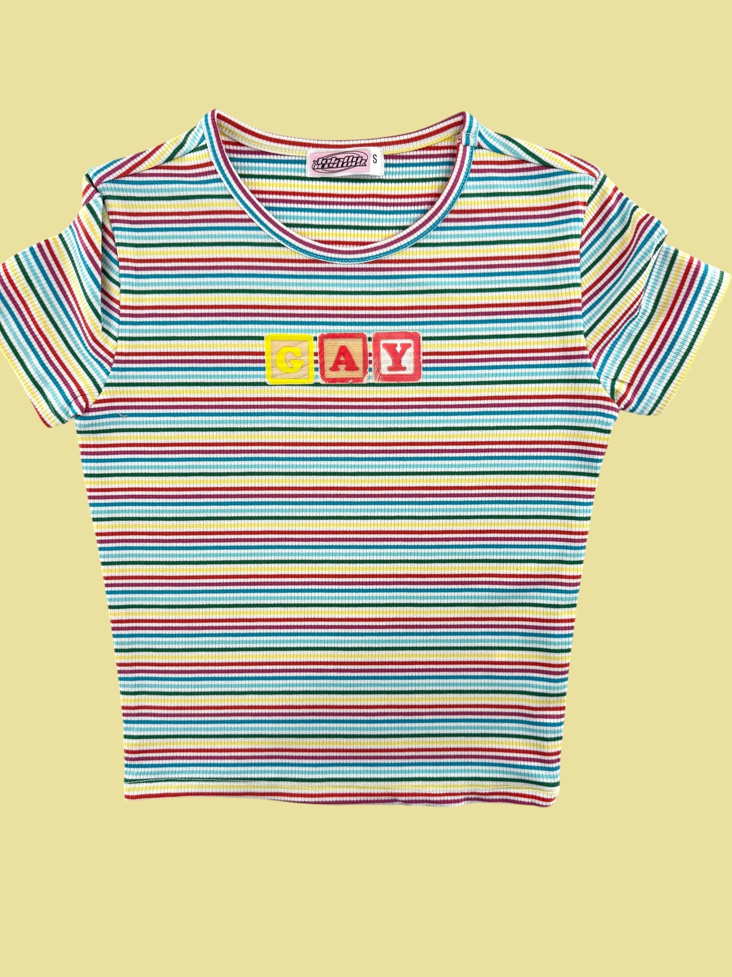 a striped t - shirt with the word love on it