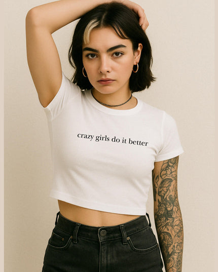 a woman wearing a white crop top with the words crazy girls do it better on