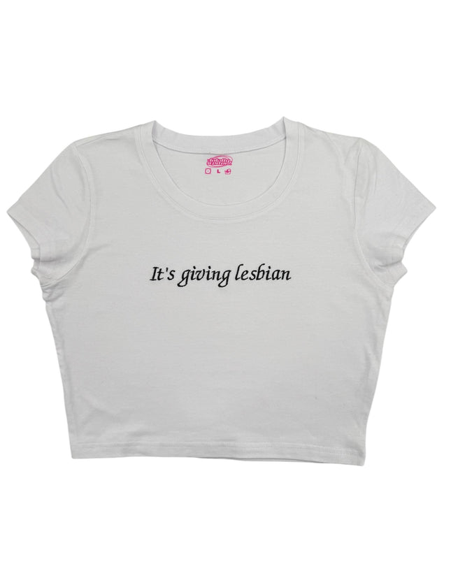 a white crop top that says it's going lesbian