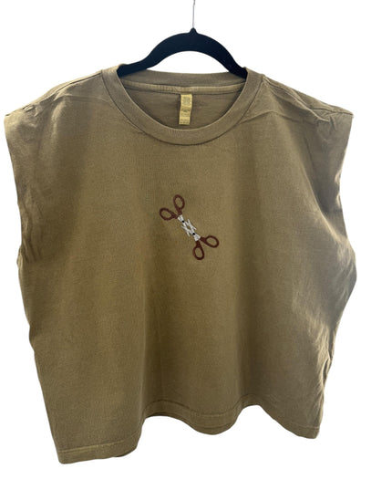 a t - shirt with a pair of scissors on it