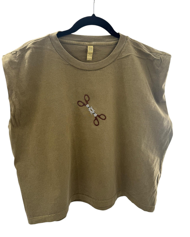 a t - shirt with a pair of scissors on it