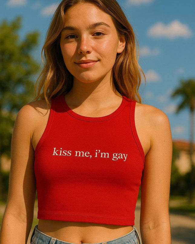 a girl in a red crop top that says kiss me, i'm gay