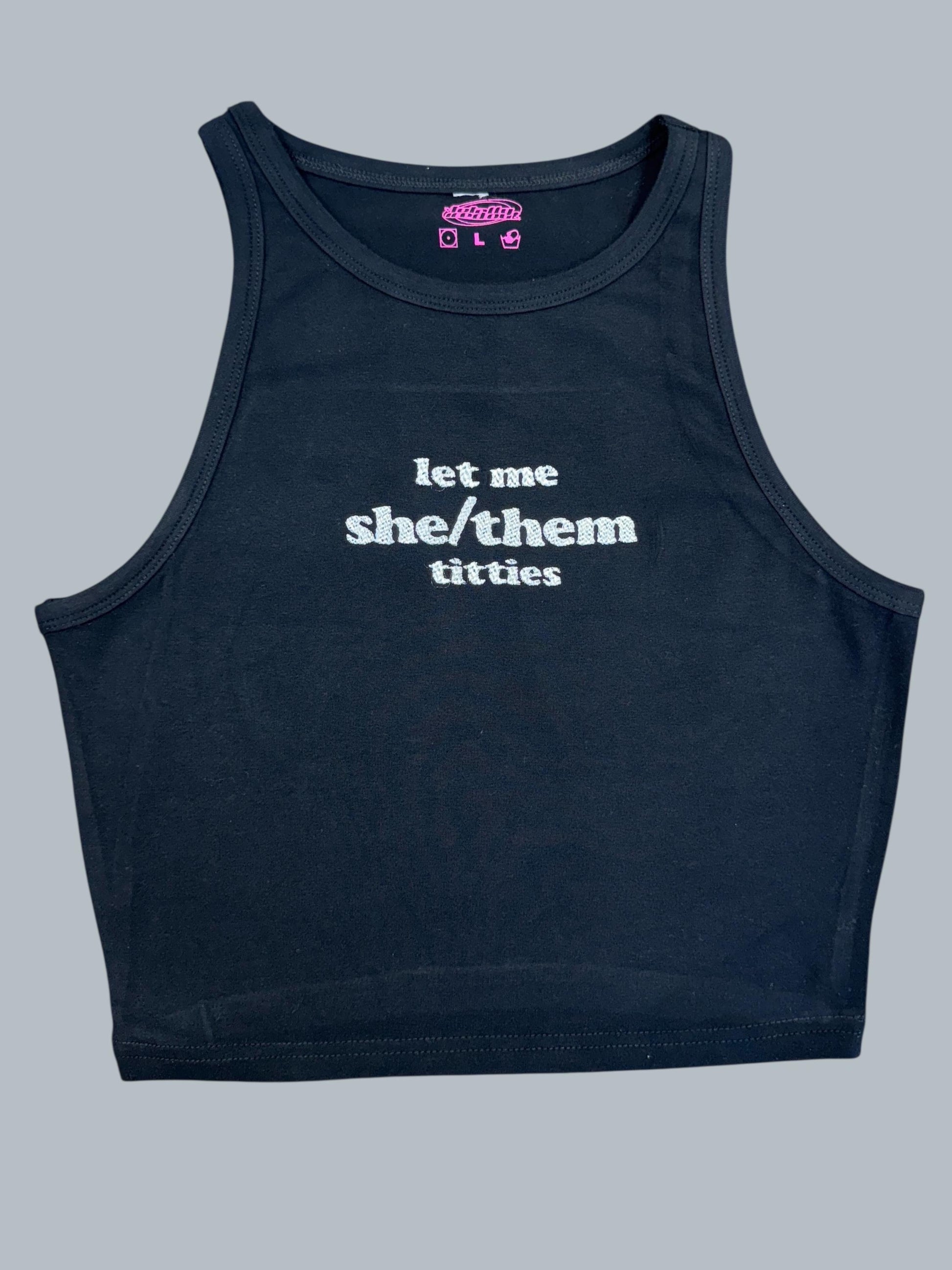 a tank top that says let me she / them bitches
