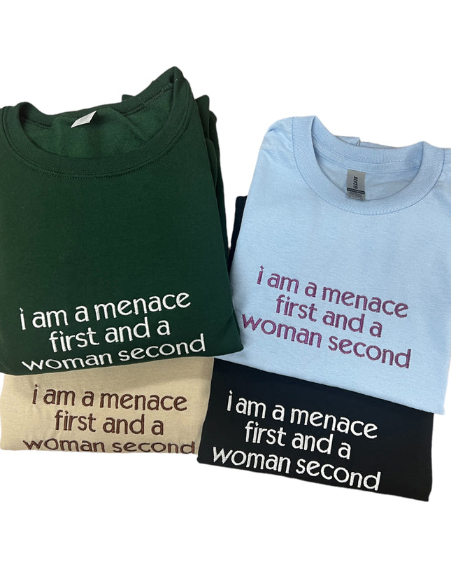 three t - shirts that say i am a menage first and a woman second