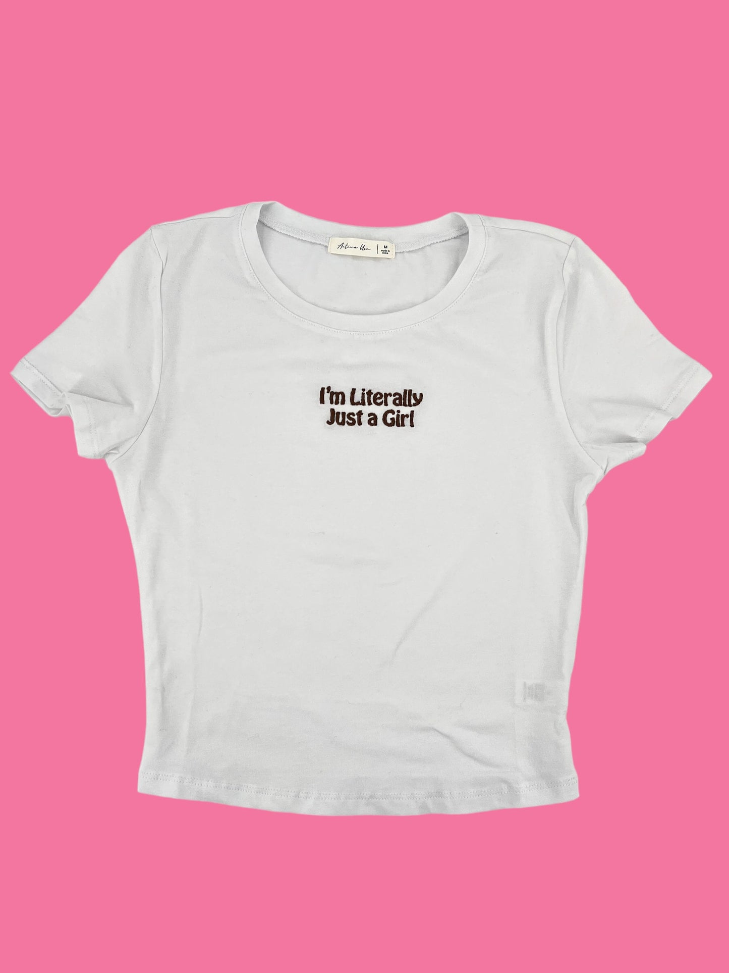a white t - shirt that says i&#39;m literally just a girl