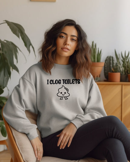 a woman sitting on a chair wearing a sweatshirt
