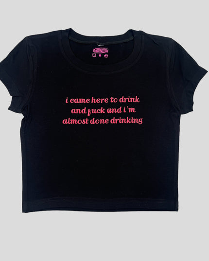 a black t - shirt with pink writing that says i came here to drink and
